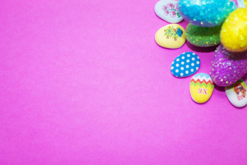 on a pink background close-up of colored Easter eggs, holiday