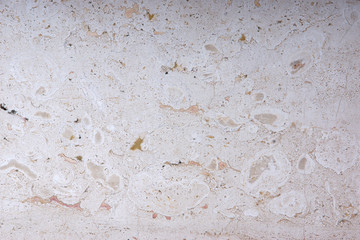 Natural stone with a beautiful pattern for interior work is called Breccia Sarda marble