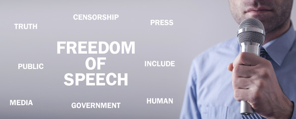 Businessman holding microphone. Freedom Of Speech
