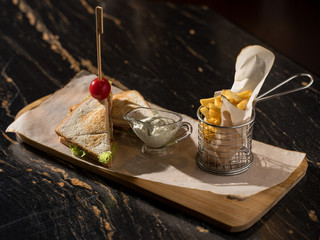 sandwich with turkey and garnish french fries