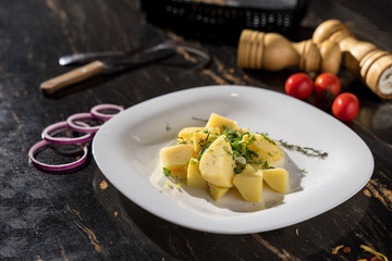 potatoes over a rustic boiled garnish restaurant serving