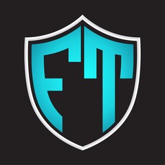 FT Logo monogram with shield shape isolated blue colors on outline design template