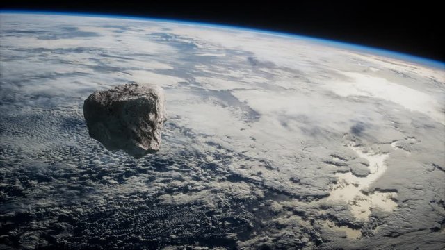 Dangerous asteroid approaching planet Earth, elements of this image furnished by NASA