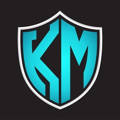 KM Logo monogram with shield shape isolated blue colors on outline design template