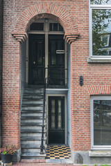 Fototapeta na wymiar pipica amsterdam house entrance, portal. vertical photography