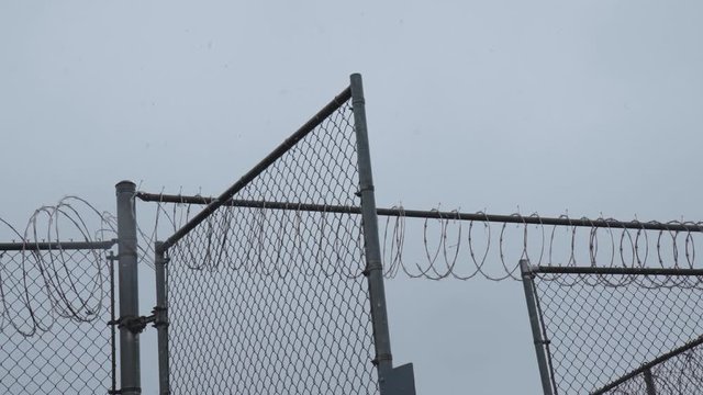 Prison Gate Closes in Slow Motion in Snow