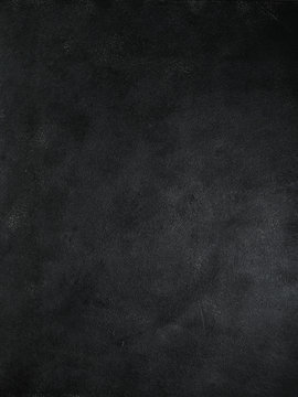 Dark moody black with grey concrete texture or background. With place for text and image