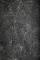 Dark moody black with grey concrete texture or background. With place for text and image