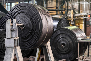 Interior of a factory for manufacturing rubber conveyor belts.