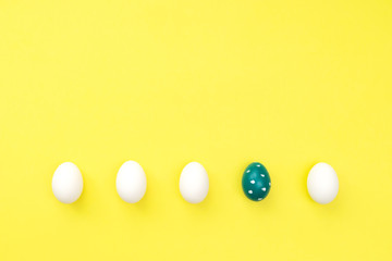 White easter eggs and painted over yellow.