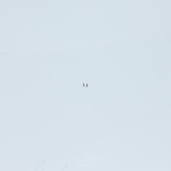 People on off-piste mountain skiing