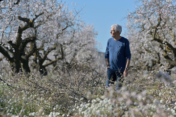 farmer man in an apple field