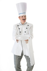 Elegant chef cook posing with a white plate on a white background