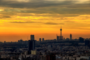 Fototapeta na wymiar beautiful sunset over Tehran-Iran skyline at an amazing afternoon with unique clouds in the sky.