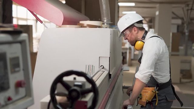 the worker knocks his hard hat on his bad day
