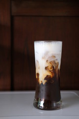 Iced coffee with milk on the table