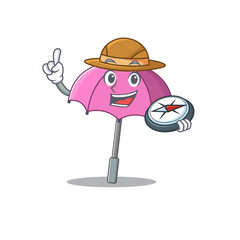 Pink umbrella an experienced explorer with a compass