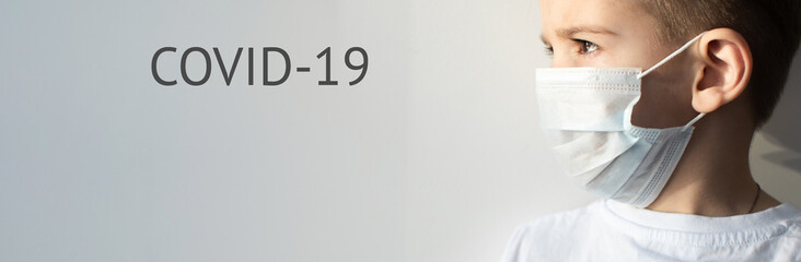 Concept of coronavirus quarantine. Child in mask . Protection against virus, infection. Health