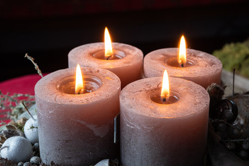 Advent wreath with four burning candles