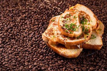 close-up. part croutons background coffee beans. 