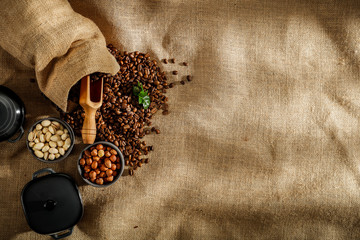 Coffee on a jute sack in the light of the morning sun in a Brazilian moody roaster
