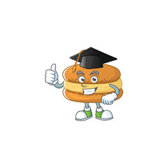 Happy face of chocolate macarons in black graduation hat for the ceremony