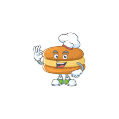 A picture of chocolate macarons cartoon character wearing white chef hat