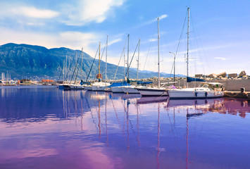Fototapeta na wymiar impressive water reflections at Kalamata harbor Peloponnese Greece 