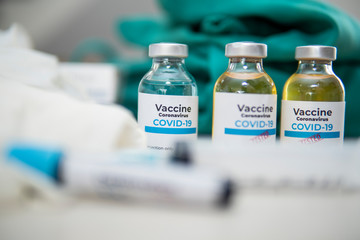 Vaccine and syringe injection. It use for prevention,immunization and treatment from corona virus infection(novel coronavirus disease 2019,COVID-19,nCoV 2019 from Wuhan). Medicine infectious concept.