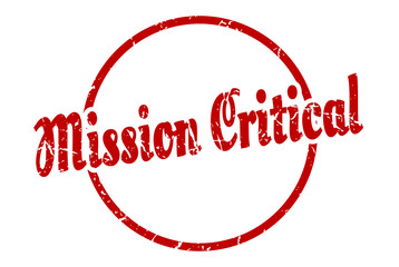 mission critical sign. mission critical round vintage grunge stamp. mission critical