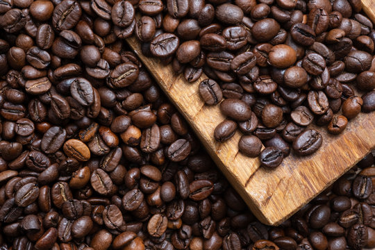 Roasted coffee bean background, top view