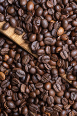 Roasted coffee bean background, top view