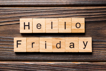 hello friday word written on wood block. hello friday text on wooden table for your desing, concept