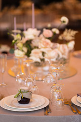 Fototapeta premium table setting with white table cloth with no food