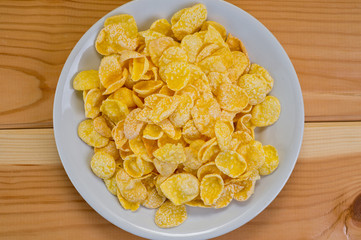 Glazed cornflakes. Breakfast cereals. Background for healthy eating and vegetarianism.