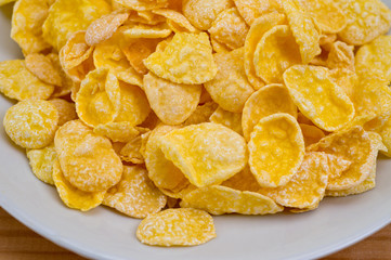 Glazed cornflakes. Breakfast cereals. Background for healthy eating and vegetarianism.