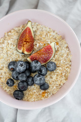 Healthy eating concept. Tasty healthy breakfast: cereal and fruit in a bowl. 