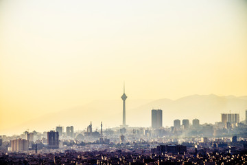 Beautiful sunset over Tehran skyline with Milad tower in the Frame and amazing colorful sky.