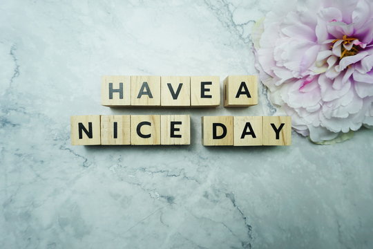 Have a Nice Day word letter message on marble background