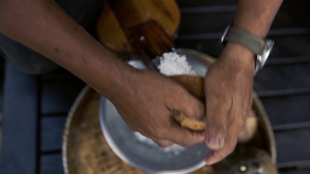 coconut milk process - Man Making coconut powder in thailand - Coconut milk process