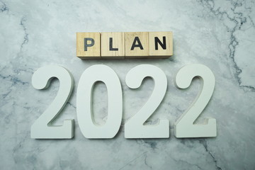 Plan 2022 alphabet letter on marble background