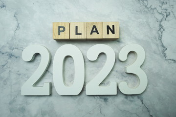 Plan 2023 alphabet letter on marble background