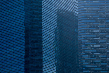 Fototapeta na wymiar Business office building district in blue tone in day time.