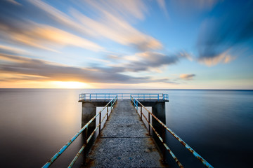 Obraz premium Jetty with railings leading into the sea, Madeira.