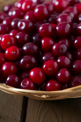 cherries on wooden surface