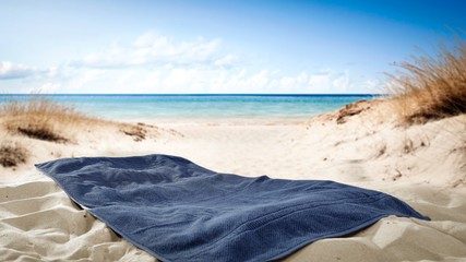 Summer towel on beach and free space for your decoration. 