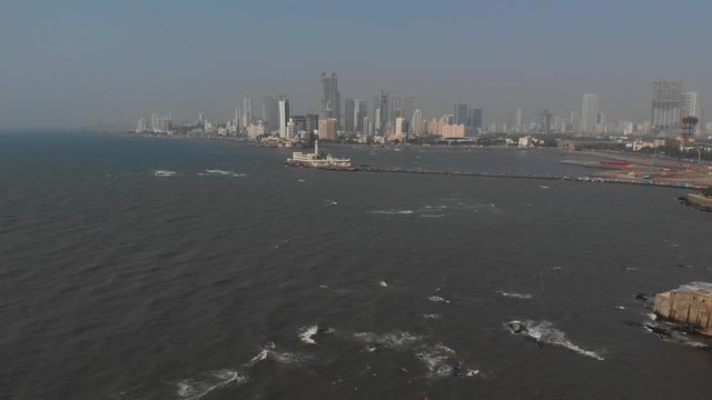 Drone shot moving back from Hajiali and the beautiful Mumbai coastline including Worli, Mahalaxmi and breach candy India