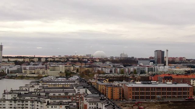 Aerial over Stockholm river pushing in towards southern skyline