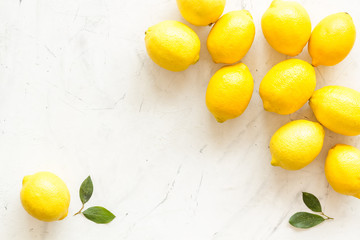 Lemons frame. Whole fruits on white backgroud top-down copy space
