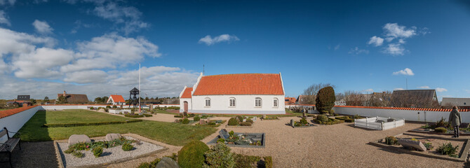 Obraz premium Very small church on Mandoe island in the wadden sea, Esbjerg Denmark